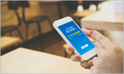 Customer review rating business concept, Woman hand using mobile phone