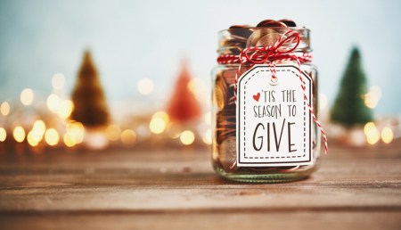 It's the season to give. Donation jar with money