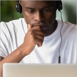 Focused,African,Student,Wear,Headphones,Studying,On-line,Do,Exercise,Using