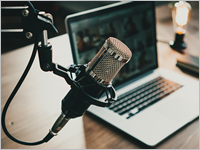 Home,Studio,Podcast,Interior.,Microphone,,Laptop,And,On,Air,Lamp