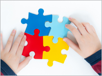 Top,View,Hands,Of,A,Little,Child,Arranging,Color,Puzzle